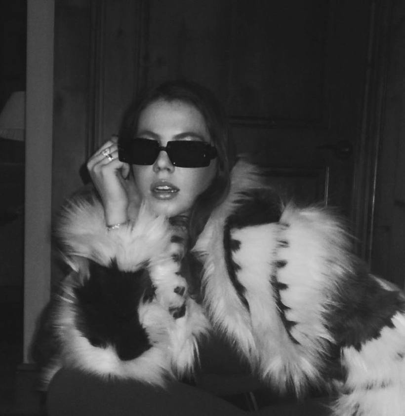 Black and white, fur coat and sunglasses