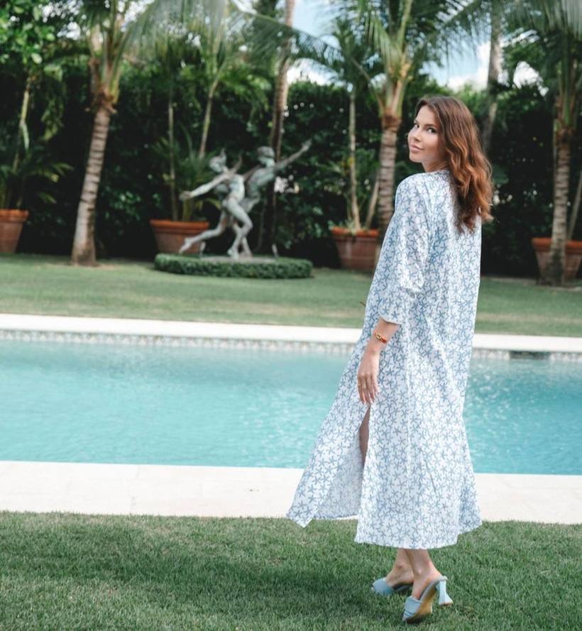 Walking poolside in a printed maxi kaftan